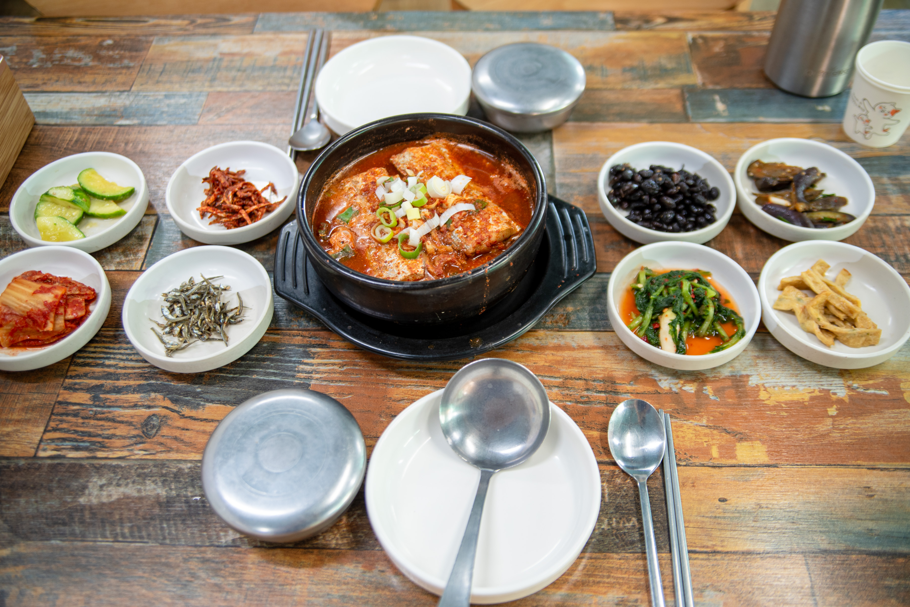 Braised cutlassfish and anchovy wrap-rice